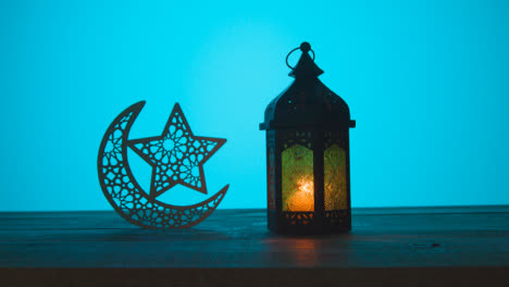 Tracking-Shot-of-Lantern-and-Symbolic-Star-and-Crescent
